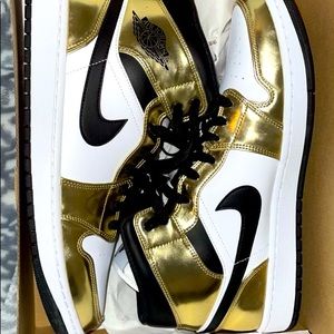 Metallic gold Jordan 1’s